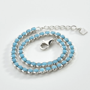 Detail of S925 sterling silver bracelet featuring turquoise beads and micro-set diamonds