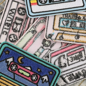 Retro cassette tape embroidered patches for clothing with music theme on denim background