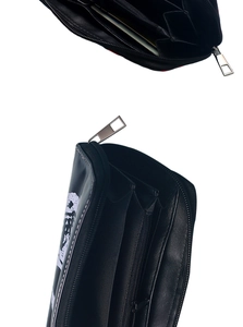 Detailed interior of vintage skull long wallet with multi-card slots and coin pocket