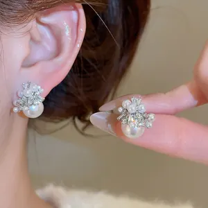 Elegant zircon firework pearl earrings in silver setting featuring a luxury vintage design