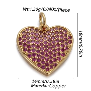 Macro detail of copper heart pendant with rose red zircon stones and 18mm height dimension