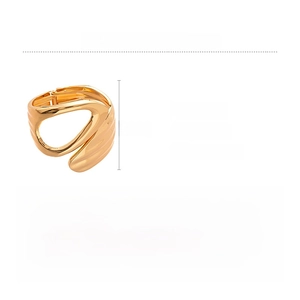 Technical drawing of a gold asymmetric open cuff with alloy material and weight details