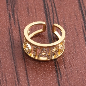 Adjustable gold STAR ring with sparkling pavé cubic zirconia on wide hollow band