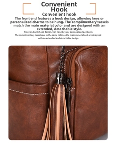 Detail view of brown lychee grain leather backpack with detachable tassel and front zipper