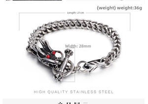 Detailed dragon head bracelet in stainless steel with red stones and a T-bar clasp
