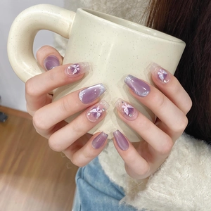 Handmade cat eye press-on nails in purple with 3D butterfly charms and silver glitter