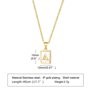 Detail of gold initial A necklace with shell inlay showing dimensions 15x12mm and 45cm chain