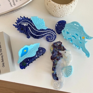 Chic ocean-themed acetate hair clips featuring sea horse jellyfish and shell shapes