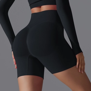 Close-up of seamless black high-waist yoga shorts featuring scrunch butt lifting detail