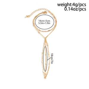 Detail view of gold metal chain bracelet with faux pearls and rhinestones plus size labels