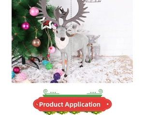 Close-up of a lifelike gray reindeer ornament with plush fur texture by a Christmas tree
