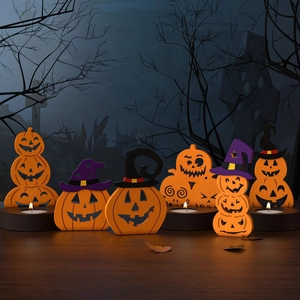 Halloween pumpkin candle holder set featuring stackable pumpkins and wizard hats ornaments