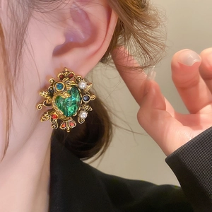 Vintage emerald glaze crown earrings with pearls in French baroque style worn by model