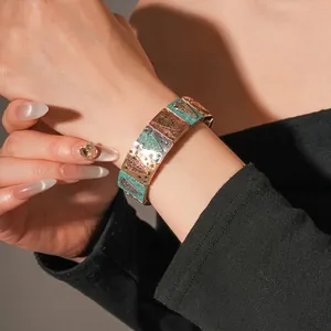 Vintage geometric enamel stretch bracelet with colorful arrow patterns and crystal accents
