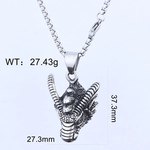 Detailed view of silver dragon pendant with measurements 37.3mm x 27.3mm and weight 27.43g
