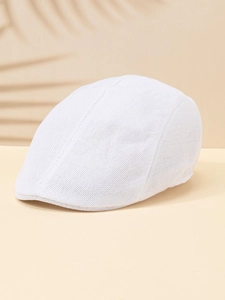 Close-up of breathable white linen mesh texture and stitching on the newsboy cap