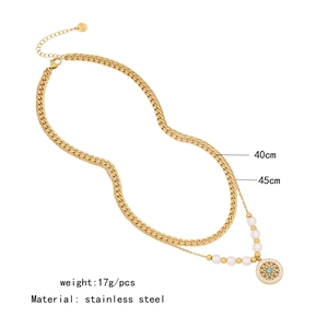 Double-layer stainless steel necklace featuring pearl beads and turquoise flower pendant