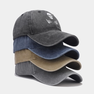 Distressed wash baseball cap set with skull embroidery in vintage streetwear style