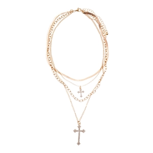 Three-layer gold necklace with cross pendants and sparkling rhinestones for women