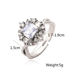 Macro shot of silver plated geometric ring featuring a large square zircon and fine crystals