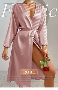 Detail of dusty rose satin robe featuring a silk-like texture and elegant tie belt