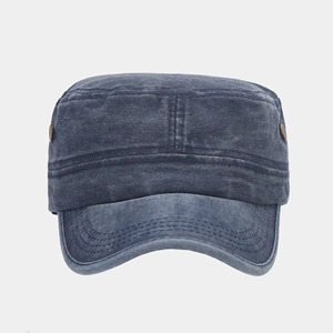 Detail of washed cotton cadet hat showing copper metal buckles and reinforced stitching