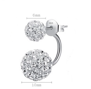 Macro detail of S925 sterling silver double pearl earrings with 6mm and 10mm crystal balls