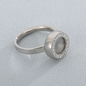 Macro view of silver stainless steel DIY ring setting with shimmering zircon pave stones