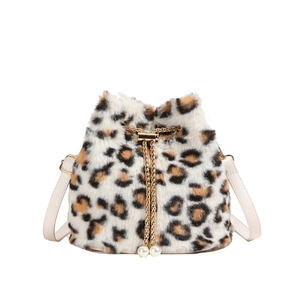 Plush faux fur bucket bag with leopard print, metal chain drawstring and pearl charm
