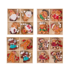 Set of four Christmas wooden gingerbread and gnome tree ornaments in rustic gift boxes