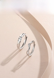 Detailed close-up of S925 sterling silver couple rings showing the S925 hallmark