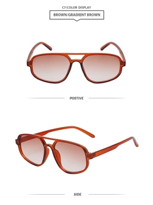 Detail view of double bridge pilot sunglasses in transparent brown with gradient lenses