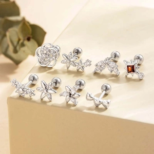 Set of 8 vintage titanium steel screw back earrings with floral zircon and star motifs