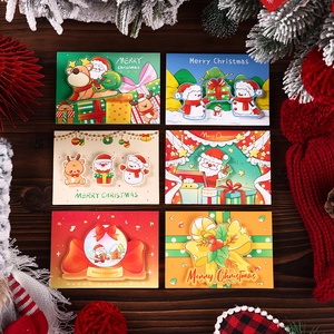 Set of 6 3D pop-up Christmas cards with colorful holiday patterns on wood background