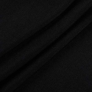 Close-up of black high-density knit fabric texture and soft material of the jumpsuit