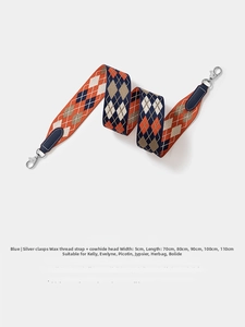 Detailed blue and orange woven strap with cowhide ends and high-gloss silver metal buckles