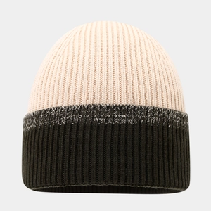 Detail of rib-knit beanie with two-tone cream and olive green colorblock stitching