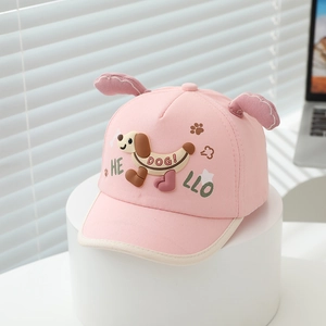 Detail of pink kids baseball cap featuring 3D dog ears and cartoon puppy embroidery