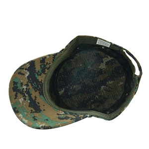Detail of digital camouflage military cap showing 65% polyester 35% cotton wash label