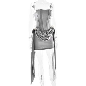 Detail of grey strapless mini dress featuring elegant draped fabric waist detailing