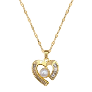 Titanium gold heart necklace set with pearl and baguette cubic zirconia accents