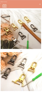 Detail of metal lobster clasps and horseshoe buckles for bag strap modification
