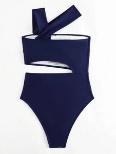 Detail of dark blue one-shoulder swimsuit with waist cutout and shoulder knot design