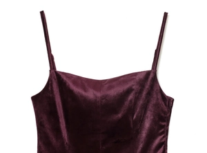 Detail of dark purple velvet camisole top with side zipper and delicate thin straps