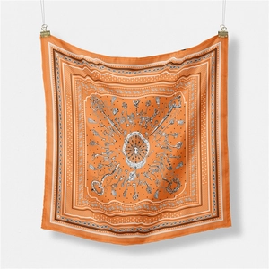 Orange silk square scarf for men featuring vintage paisley and key patterns