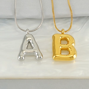 Gold and silver chubby bubble initial necklaces with snake chain in balloon style