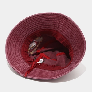 Burgundy washed cotton bucket hat interior with sweatband and adjustable drawstring feature