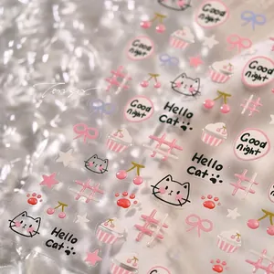 Macro d'autocollants 3D pour ongles avec chats roses, nœuds et motifs cupcakes
