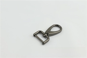 Detail of gunmetal lobster swivel clasp with D-ring for bags and shoulder straps