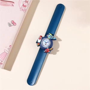 Detail of blue rocket cartoon slap watch with clear dial and soft silicone strap